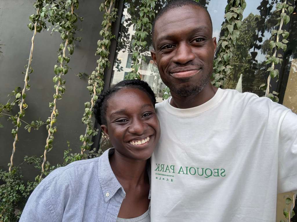 Joshua and Lucia among greenery